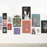 Collection of motivational posters on a wall
